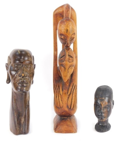 Appraisal: Tribal Art Three carved wooden figures comprising a bald headed