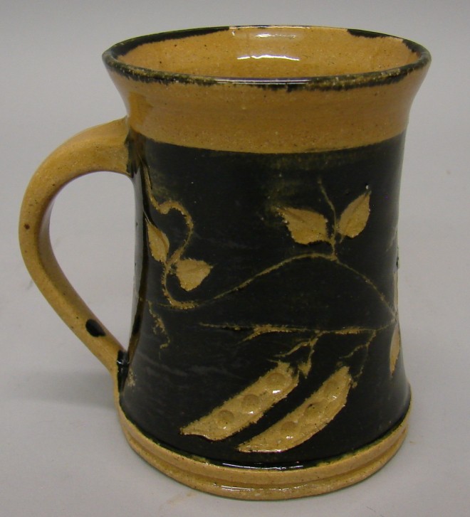 Appraisal: Mug - Black brown color leaf applied handle tall L