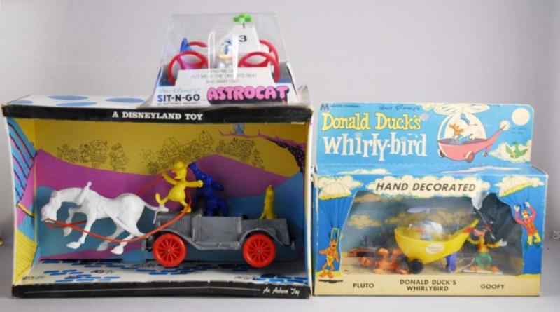 Appraisal: Lot of Walt Disney Donald Duck Vehicle Toys Description Circa