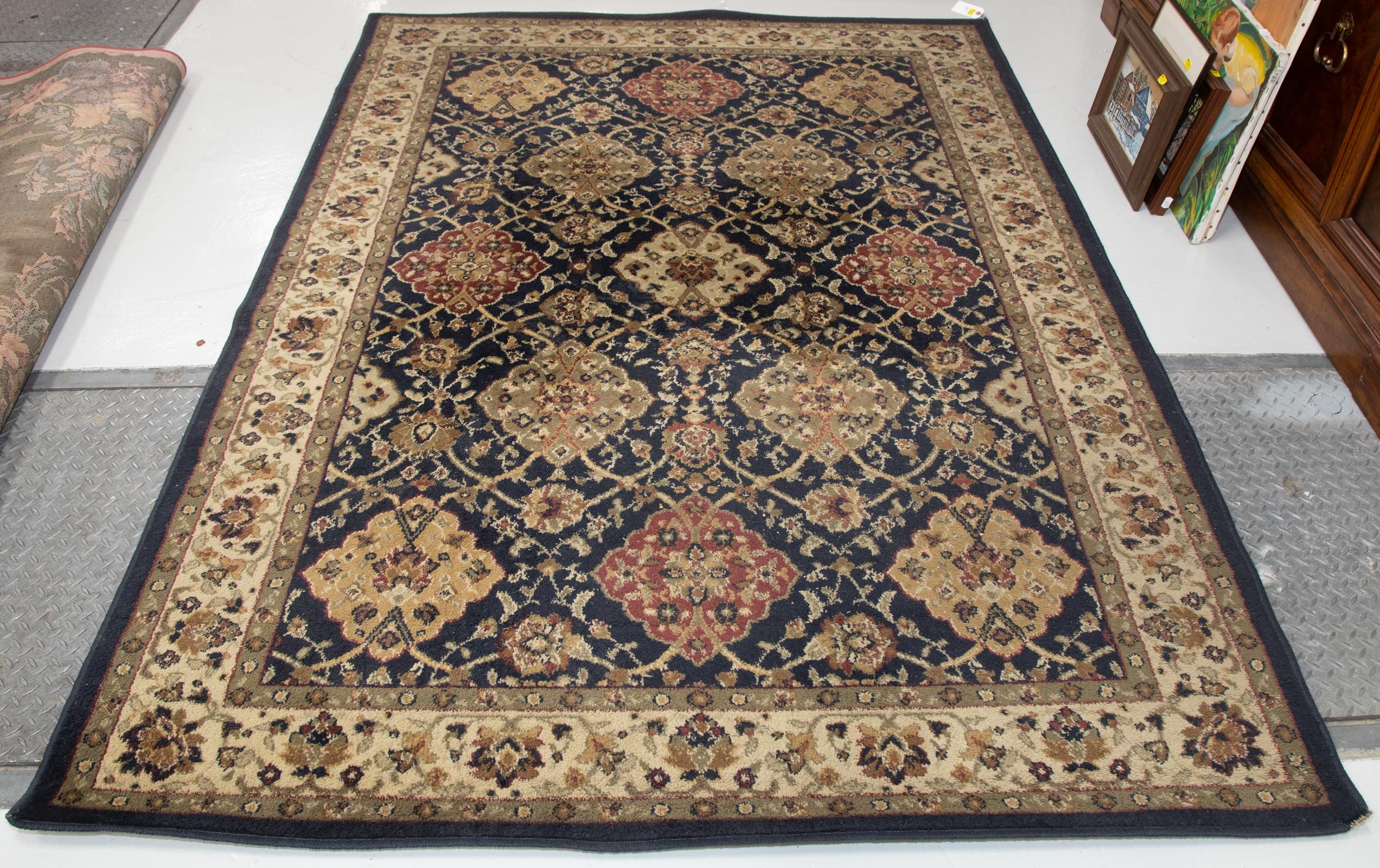 Appraisal: PERSIAN DESIGN RUG X Modern machine made polypropylene