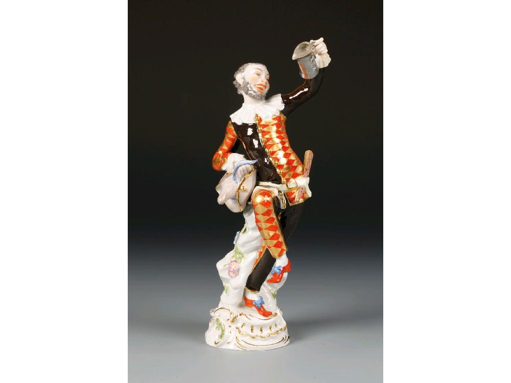 Appraisal: A LATE MEISSEN FIGURE OF A HARLEQUIN holding a silver