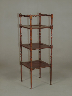 Appraisal: A mahogany three tier whatnot circa of square form with