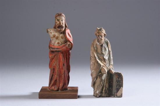 Appraisal: TWO CARVED AND PAINTED WOOD FIGURES th century One of