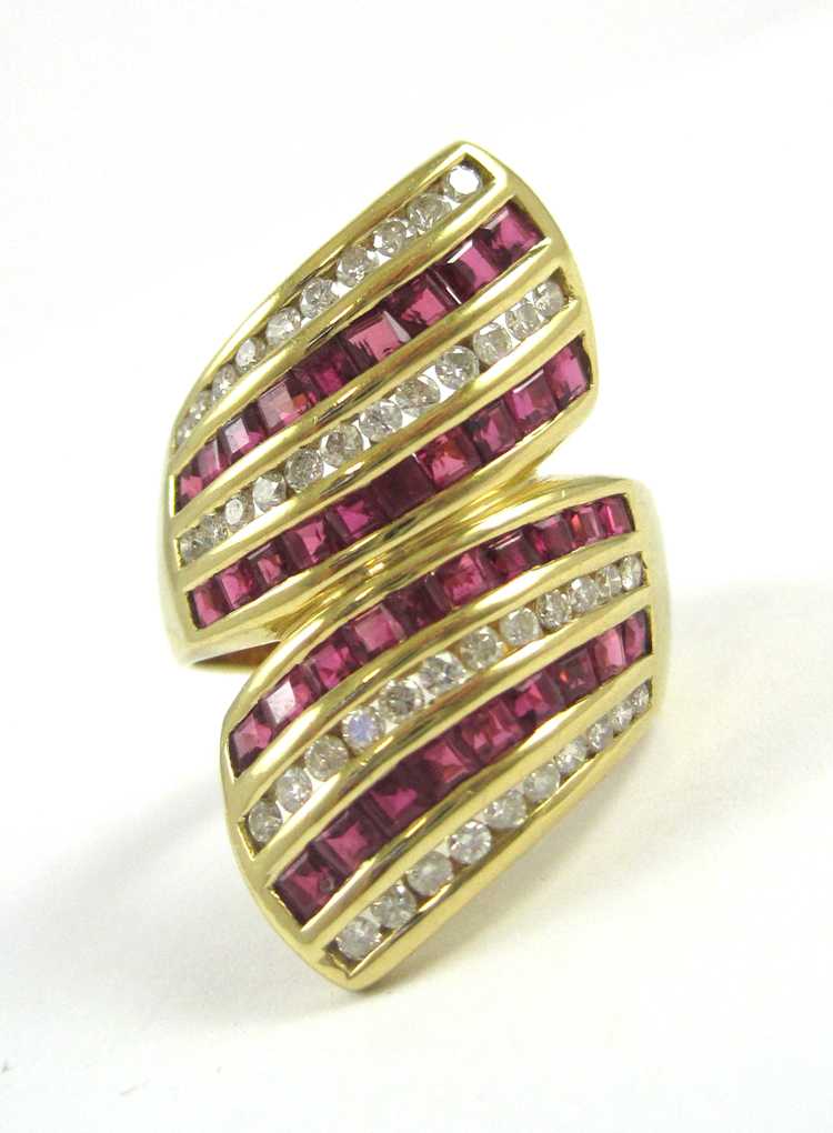 Appraisal: RUBY DIAMOND AND EIGHTEEN KARAT GOLD RING set with two