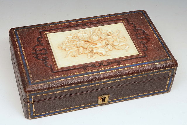 Appraisal: A LATE VICTORIAN LEATHER AND GOLD TOOLED JEWELLERY BOX with