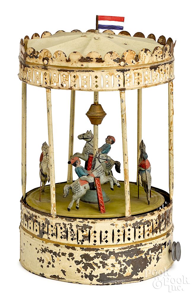 Appraisal: Carousel steam toy accessory Painted and tin lithograph carousel steam