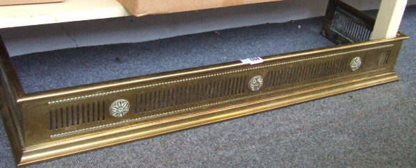 Appraisal: A Victorian brass fire fender cm wide together with a