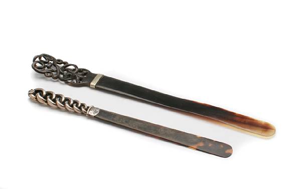 Appraisal: An English sterling and tortoiseshell page turner with impressed English