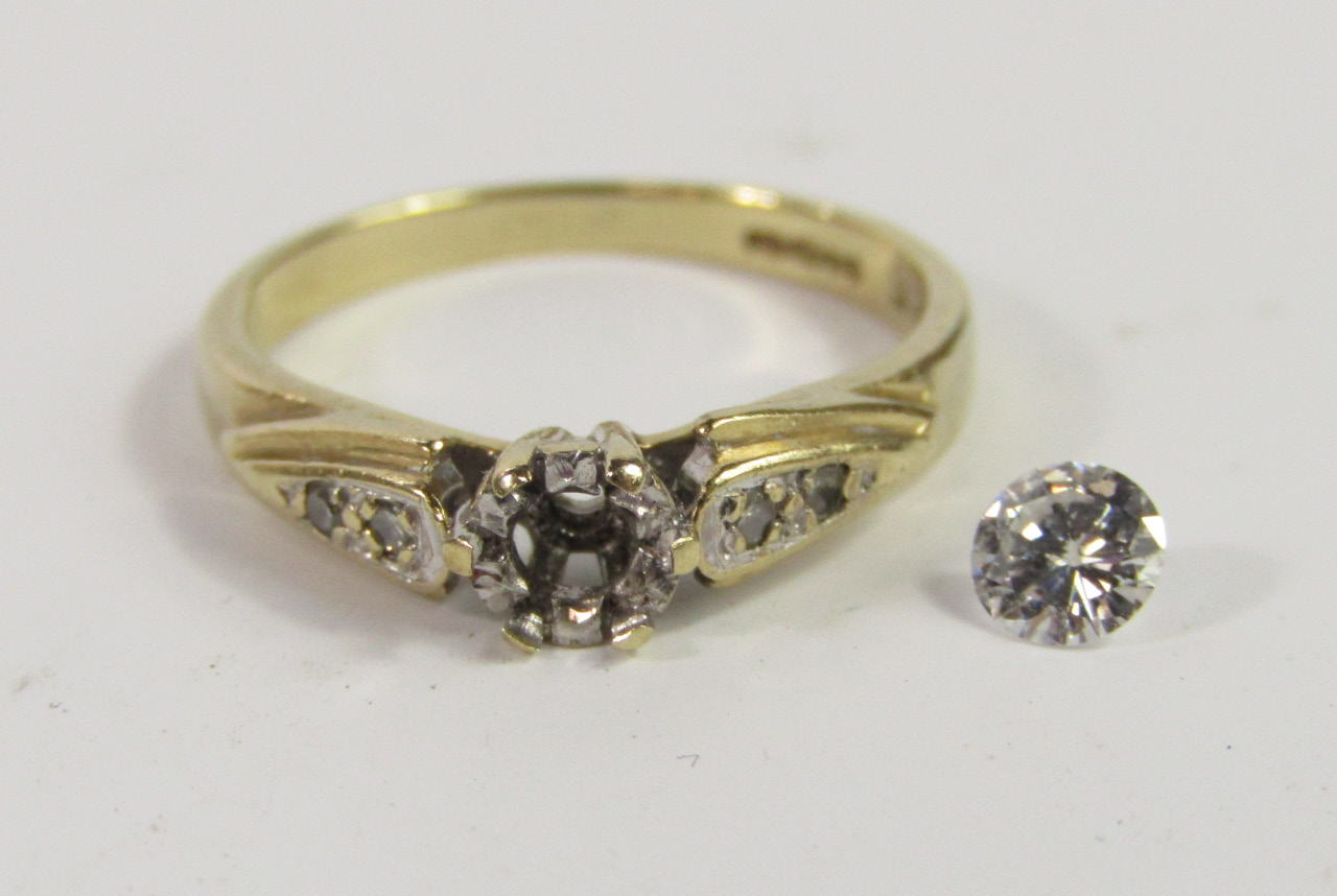 Appraisal: A ct gold and diamond solitaire ring with diamond set