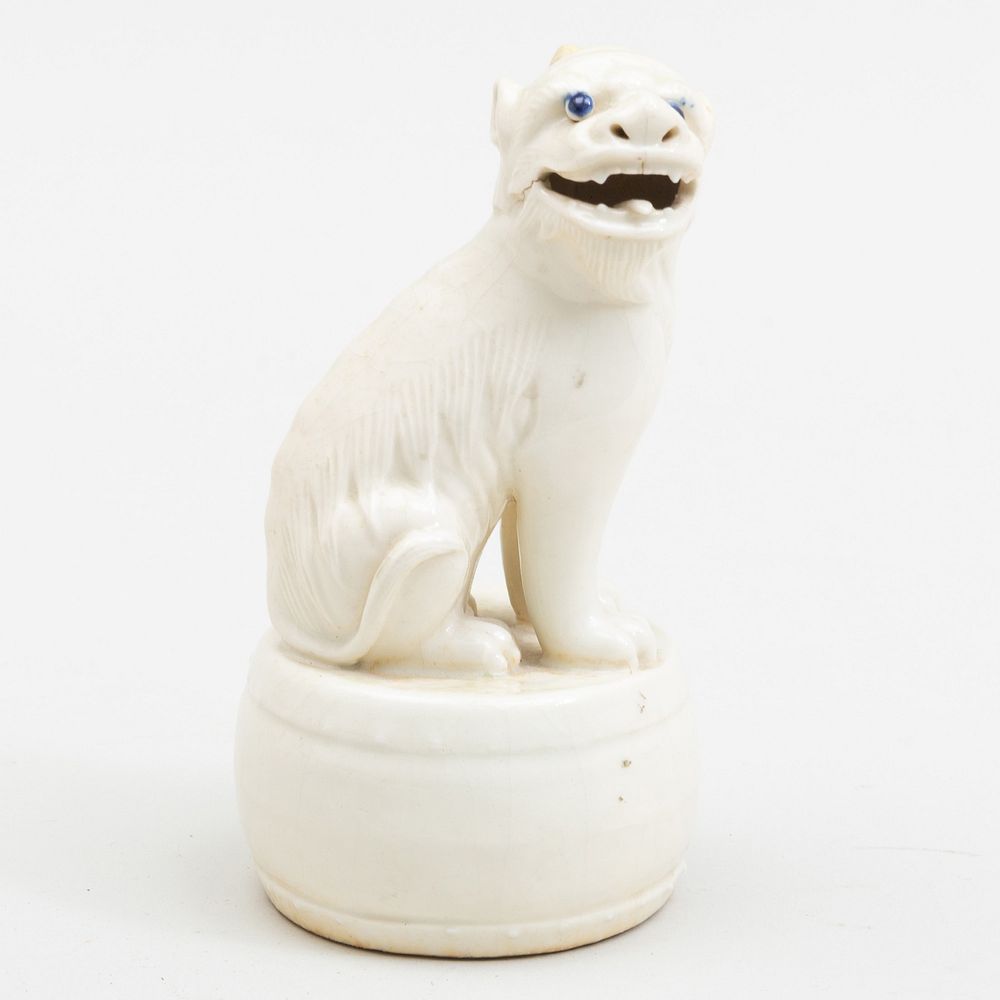 Appraisal: White Glazed Japanese Porcelain Model of a Mythical Beast x