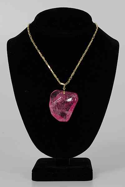 Appraisal: Pink Tourmaline Necklace A large free-form polished natural pink tourmaline