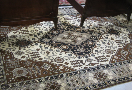 Appraisal: PERSIAN TOOS CARPET central medallion and surrounding flora design in