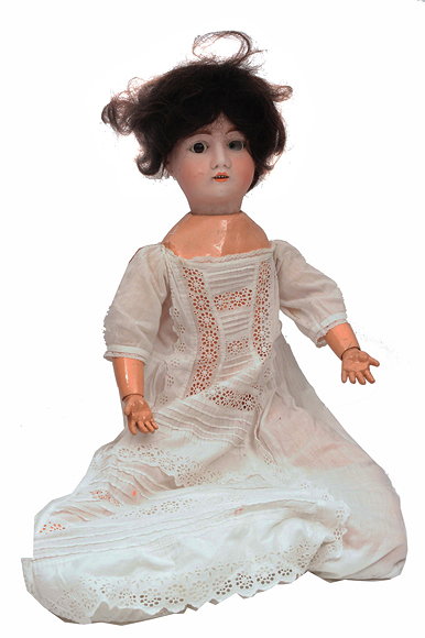 Appraisal: A LARGE OLD BISQUE HEADED CONTINENTAL PORCELAIN DOLL with moving