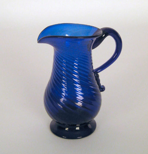 Appraisal: Cobalt glass creamer early th c with a swirl ribbed