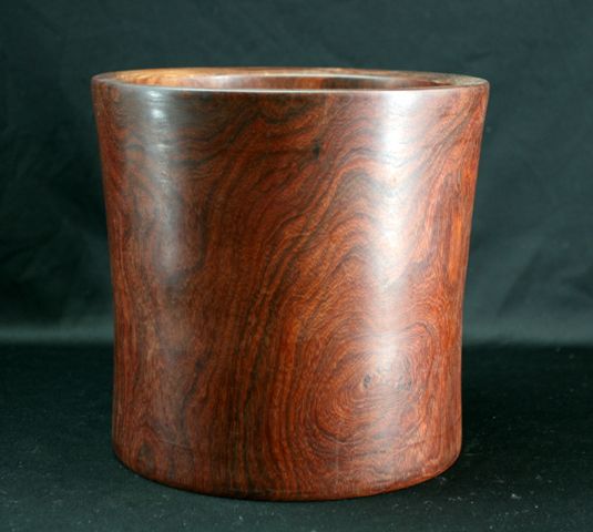 Appraisal: A Huanghuali brushpot with dominant grains cm high cm diameter