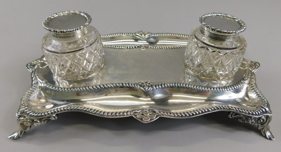 Appraisal: An Edwardian silver inkstand of rectangular form with beaded borders