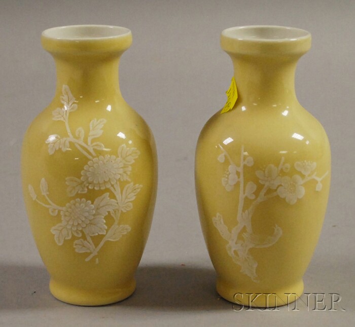 Appraisal: Pair of Porcelain Vases China one with molded design of