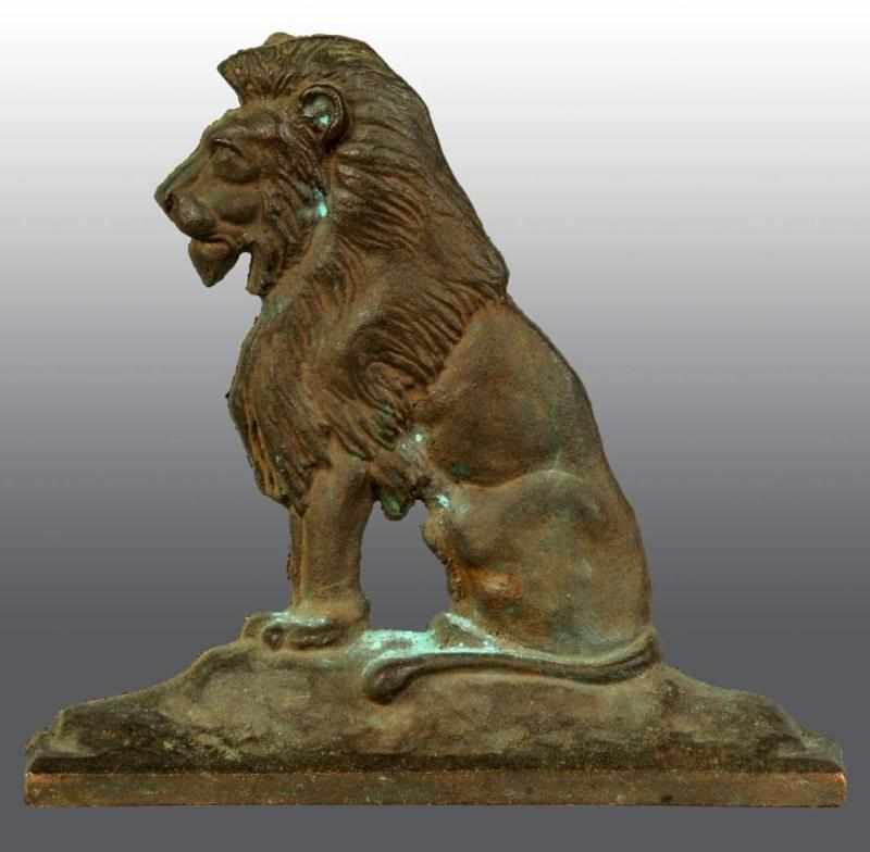 Appraisal: Cast Brass Sitting Lion Doorstop Description Marked BSC Condition Very