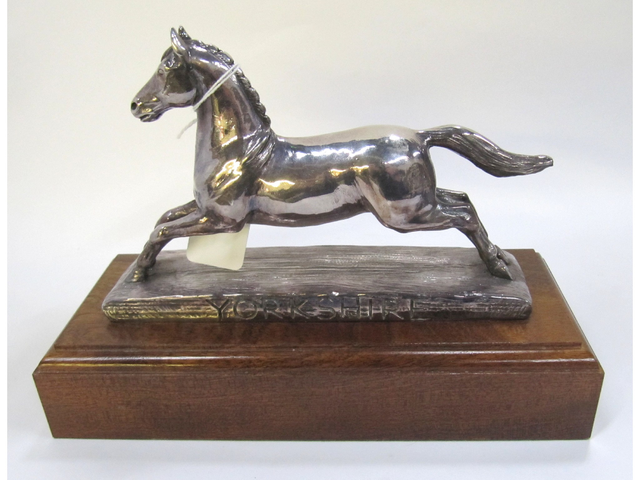 Appraisal: A silver plated figure of a horse marked Yorkshire