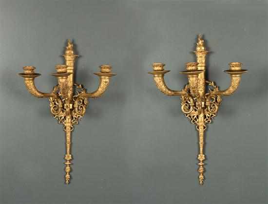 Appraisal: Pair of French Empire style bronze dore three-light bras de