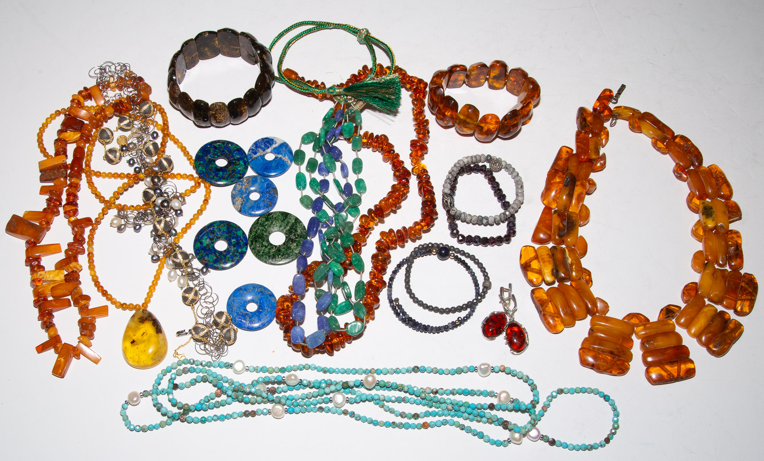 Appraisal: A BAG OF AMBER PEARL GEMSTONE NECKLACES Including eight beaded