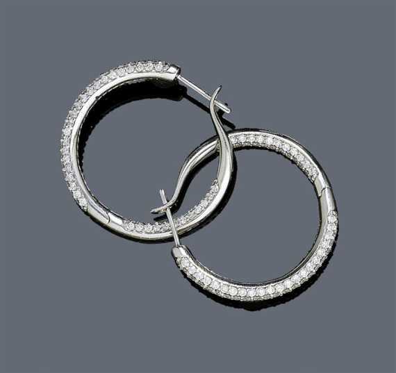 Appraisal: DIAMOND CREOLES White gold Elegant creole ear stud set throughout