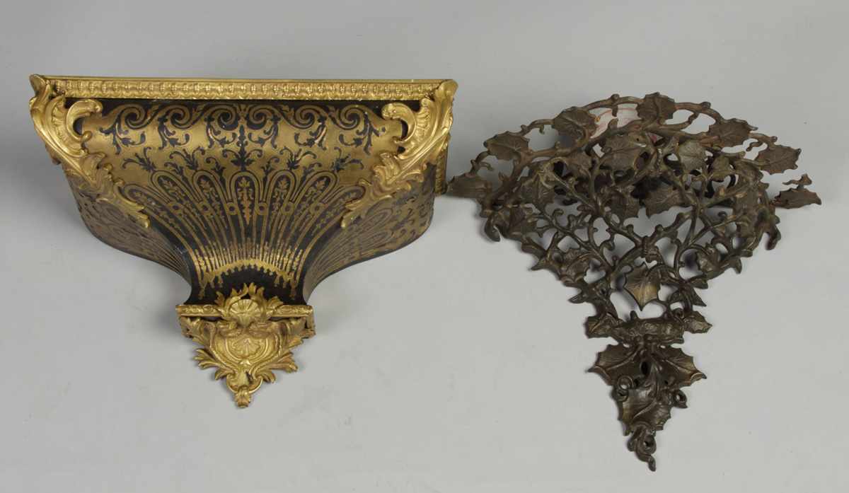 Appraisal: Wall brackets one cast iron one inlaid boule Wall brackets