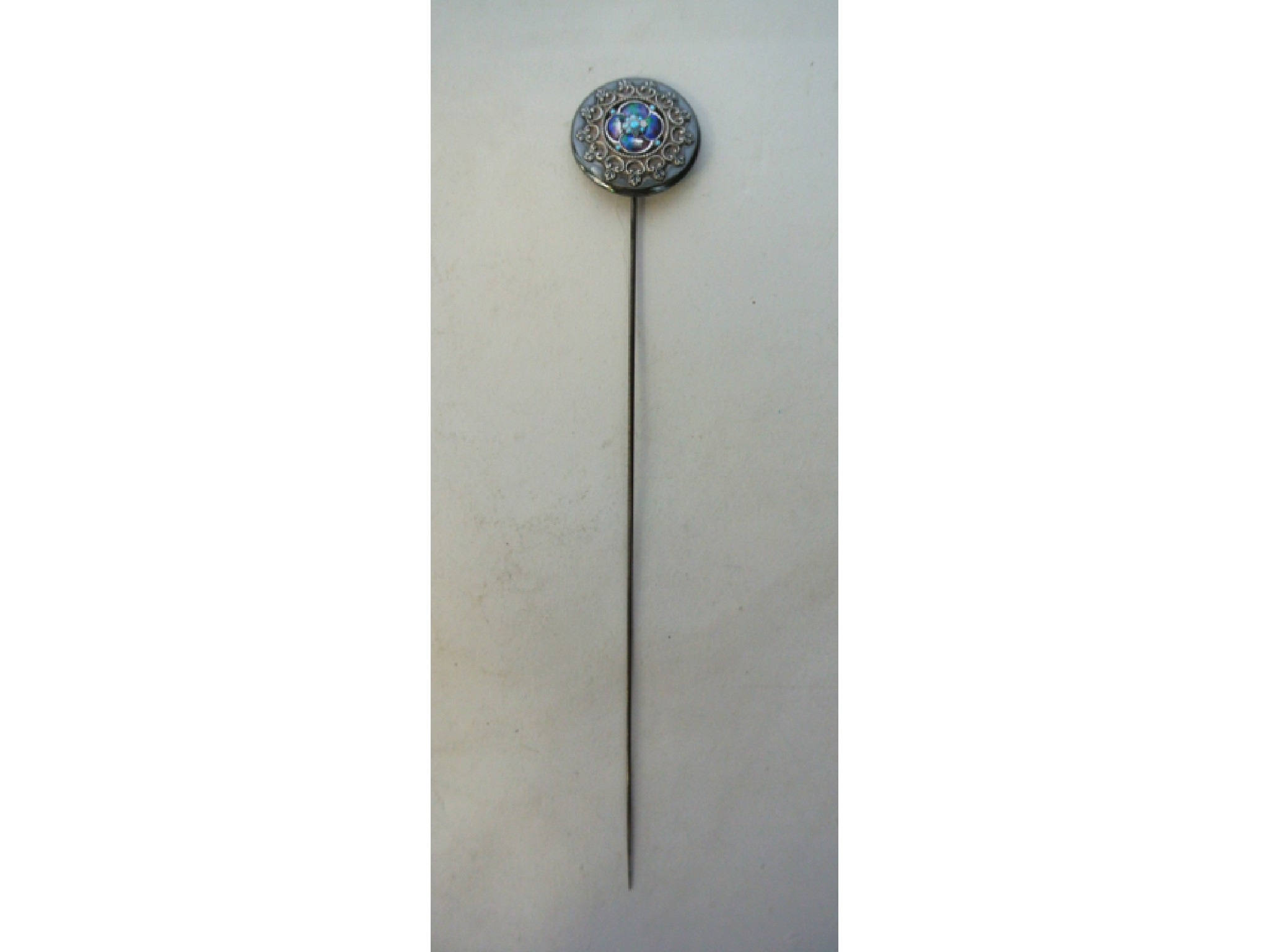 Appraisal: An Edwardian silver hatpin Charles Horner Chester probably the circular