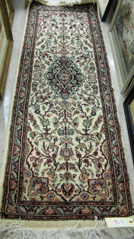 Appraisal: A PAIR OF ORIENTAL AREA RUGS Pakistani Persian floral and