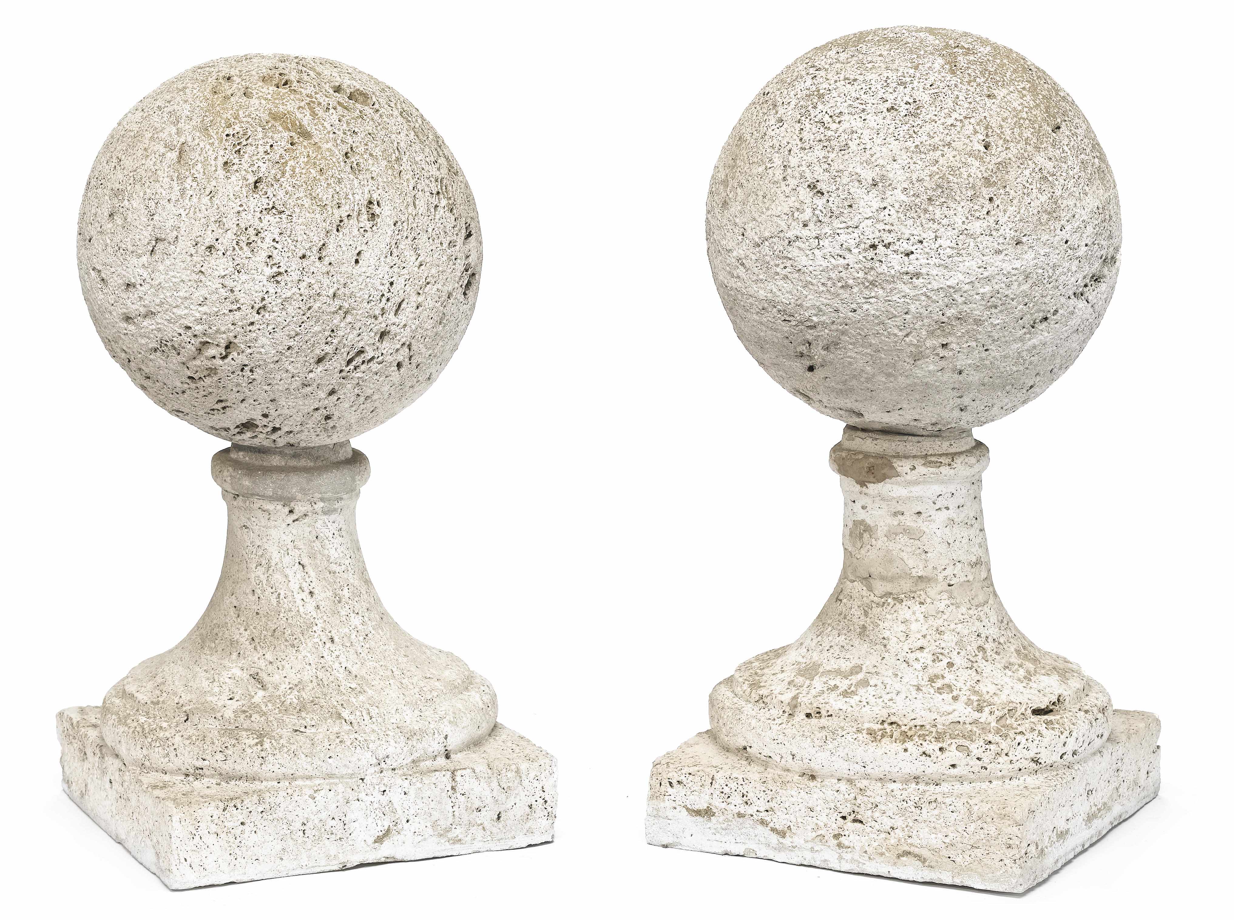 Appraisal: A pair of carved stone orb form finials overall height