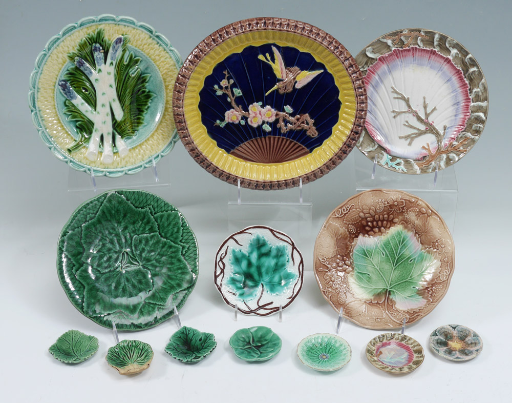 Appraisal: PIECE COLLECTION OF MAJOLICA PLATES AND BUTTER PATS In a