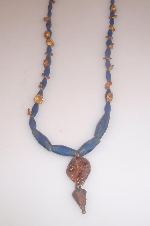 Appraisal: A Roman necklace comprising thirty-seven blue faceted cut glass beads