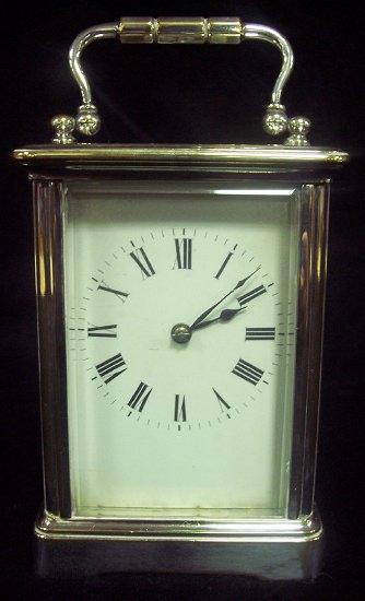 Appraisal: A gilt brass cased carriage clock the enamel dial with