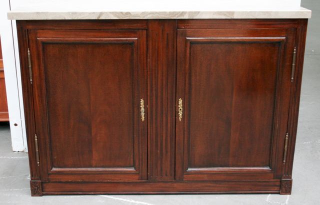 Appraisal: A French style mahogany and marble topped side cabinet th