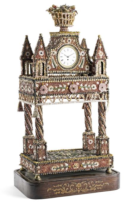 Appraisal: CONTINENTAL SHELLWORK TEMPLE CLOCK TH CENTURY the white enamel dial