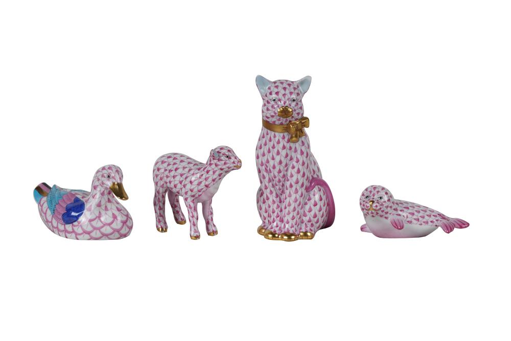 Appraisal: FOUR HEREND PINK FISHNET ANIMALScomprising lamb cat duck and seal