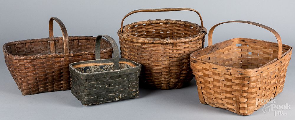 Appraisal: Four splint gathering baskets th c Four splint gathering baskets