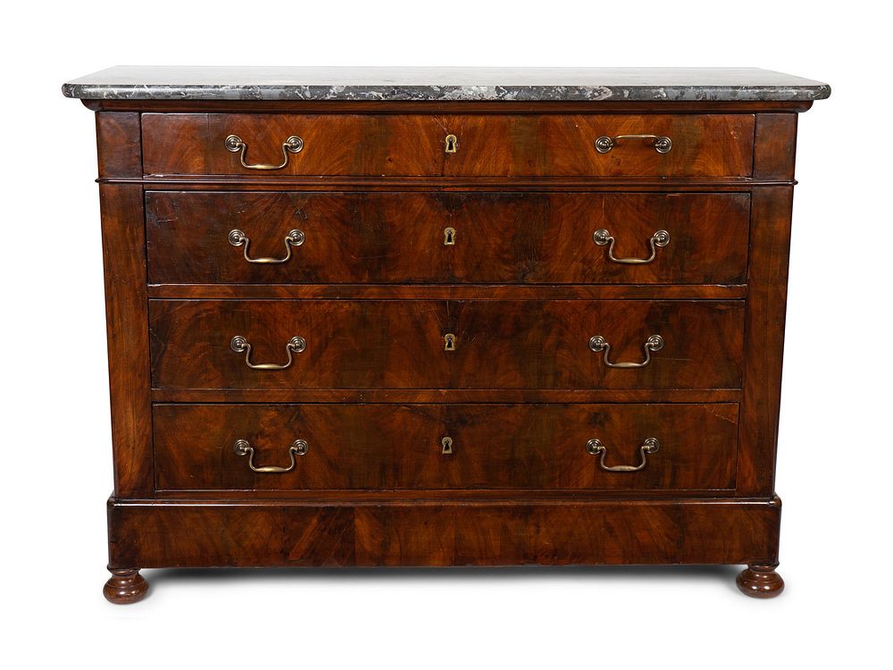 Appraisal: An Empire Style Figured Mahogany Marble Top Chest of Drawers