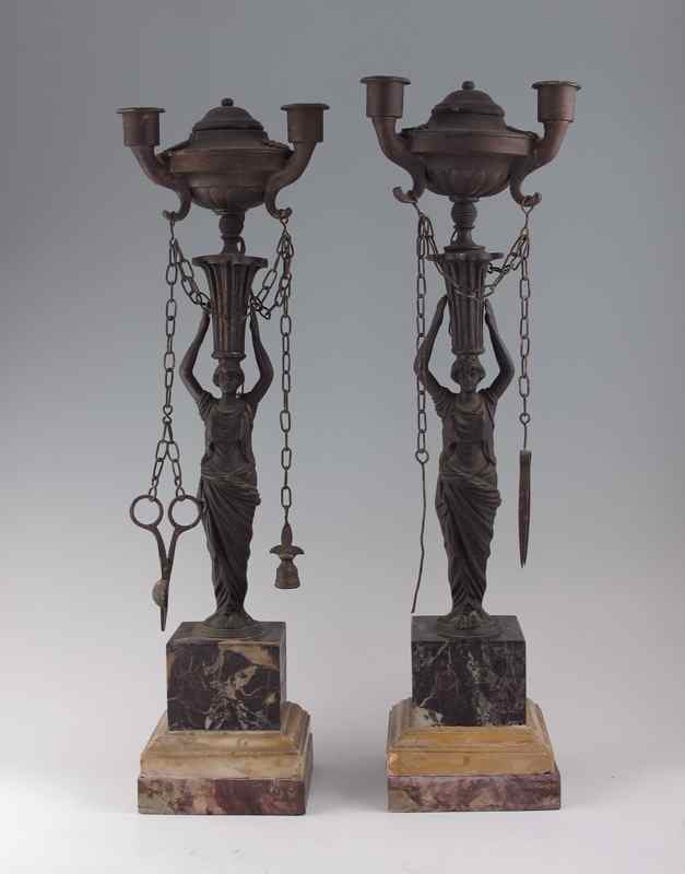 Appraisal: PAIR OF FIGURAL LIGHT OIL LAMPS Pair of cast metal