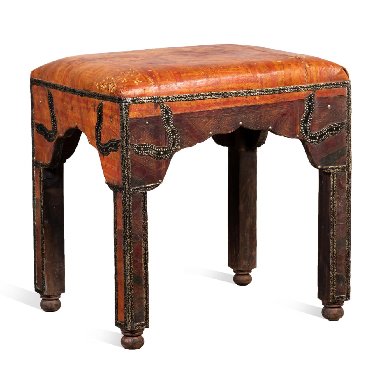 Appraisal: MOROCCAN STOOL WITH TUAREG LEATHER UPHOLSTERY Moroccan stool executed in