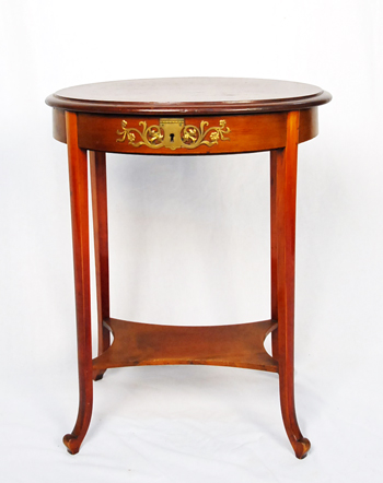 Appraisal: A th C Oval Mahogany Side Table having an ormolu