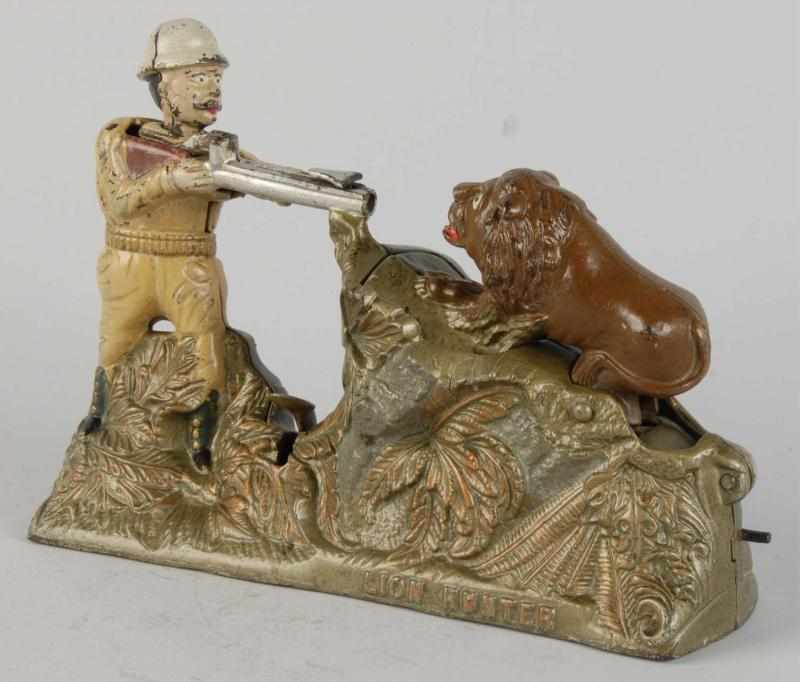 Appraisal: Cast Iron Lion Hunter Mechanical Bank Description Manufactured by J