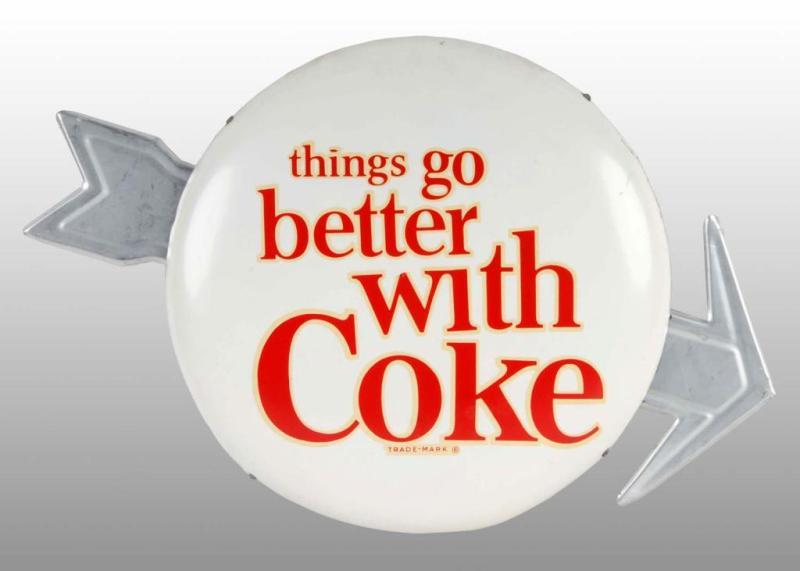 Appraisal: Tin Coca-Cola Button with Arrow Description s to s Only