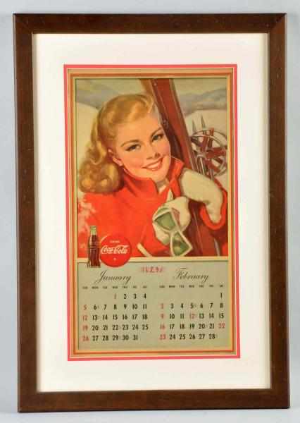 Appraisal: Coca-Cola Calendar Framed and matted under plexiglass A few small