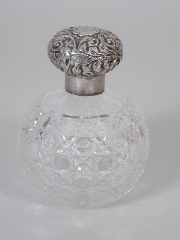 Appraisal: A Victorian silver lidded cut glass Scent Bottle of globular