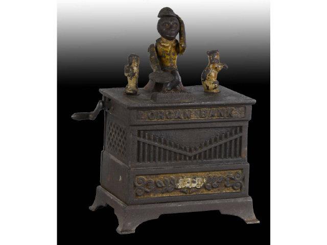 Appraisal: Cast Iron Organ Mechanical Bank Description Dog and cat paint