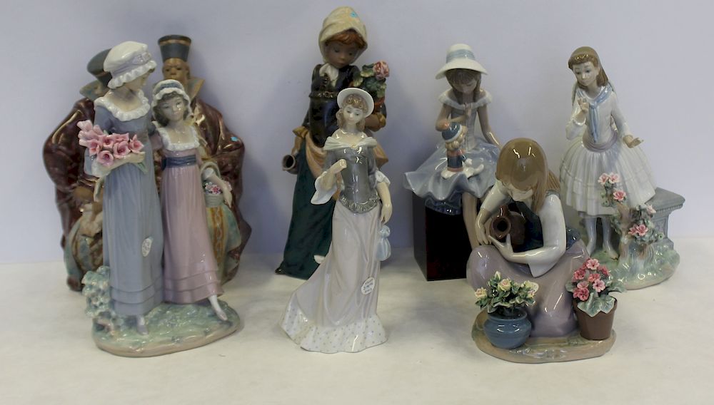 Appraisal: Lladro Grouping of Porcelain Figurines To include one pair of