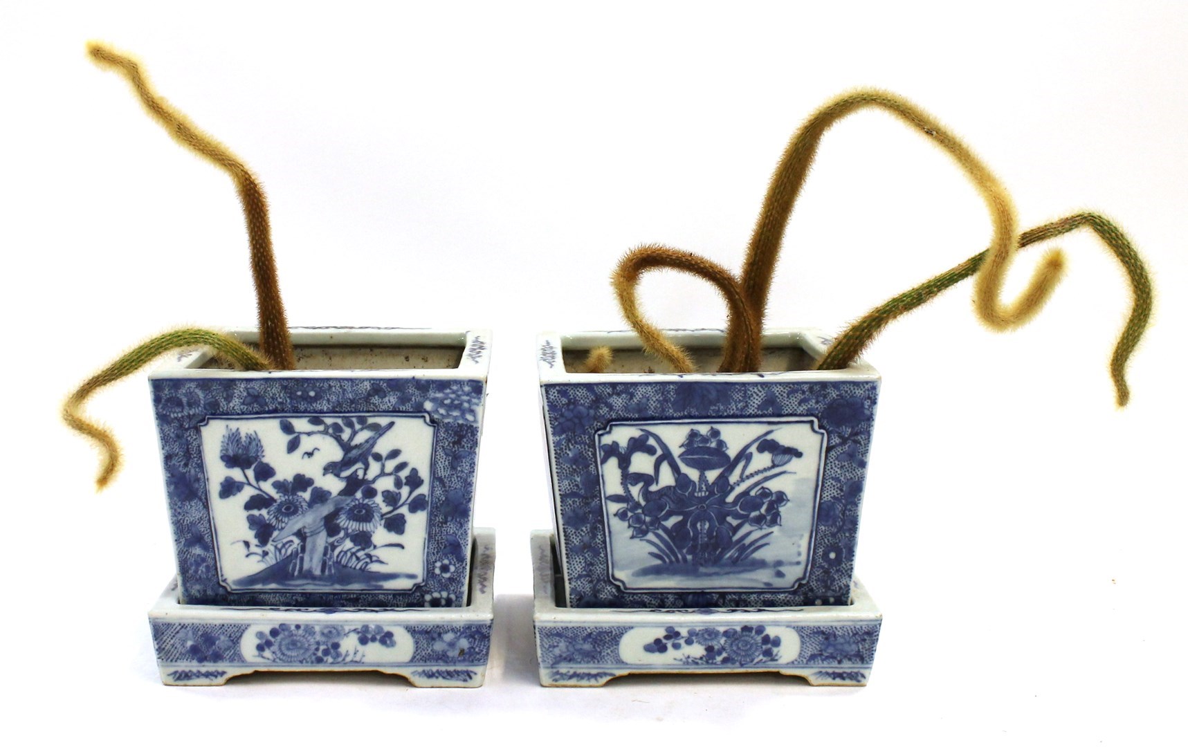 Appraisal: A pair of Chinese blue and white square jardinieres and