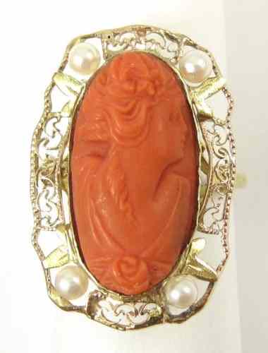 Appraisal: CAMEO PEARL AND TEN KARAT GOLD RING four white pearls