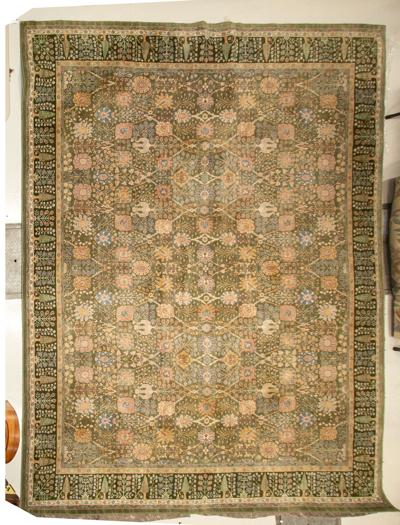 Appraisal: KARASTAN GREEN PERSIAN GARDEN CARPET X Machine made wool pile